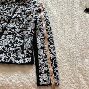 Black & white floral jacket w  black offset zipper & black back & under arms